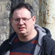 UCD professor charged with harassment and unlawfully accessing  students data