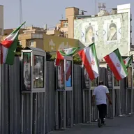 Iran warns U.S. to stay out as Washington debates military action