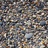 Warum findet man am Strand keine kugelrunden Steine bzw. Kiesel?