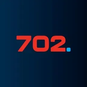 702